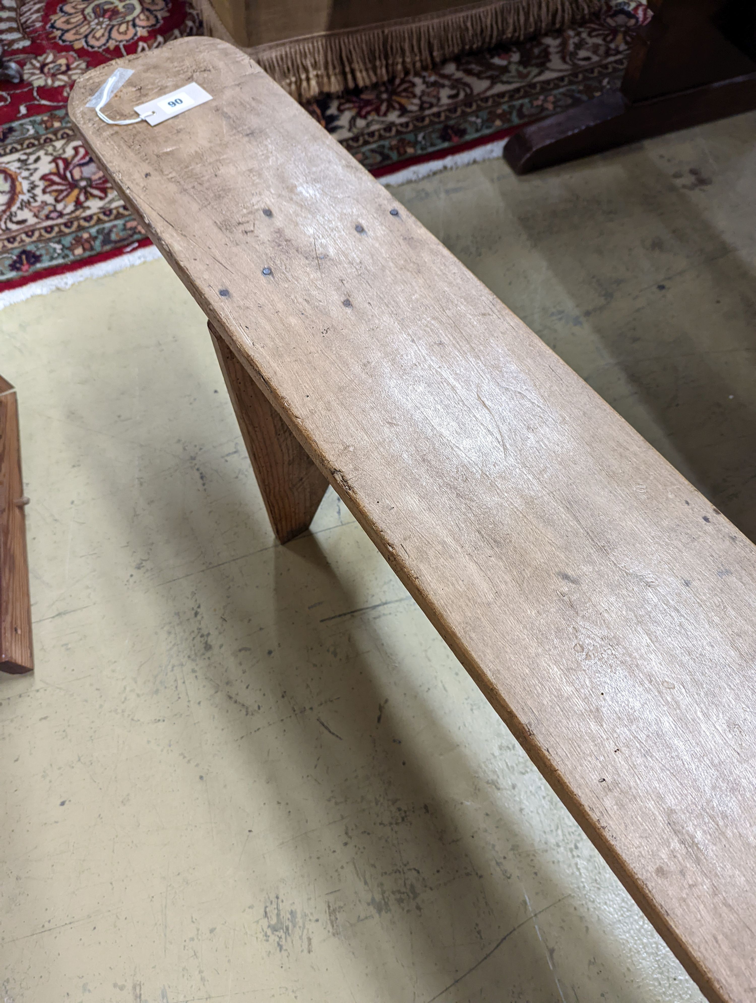 A pair of 19th century pine benches. Length-220cm, Depth-21, Height - 45cm.